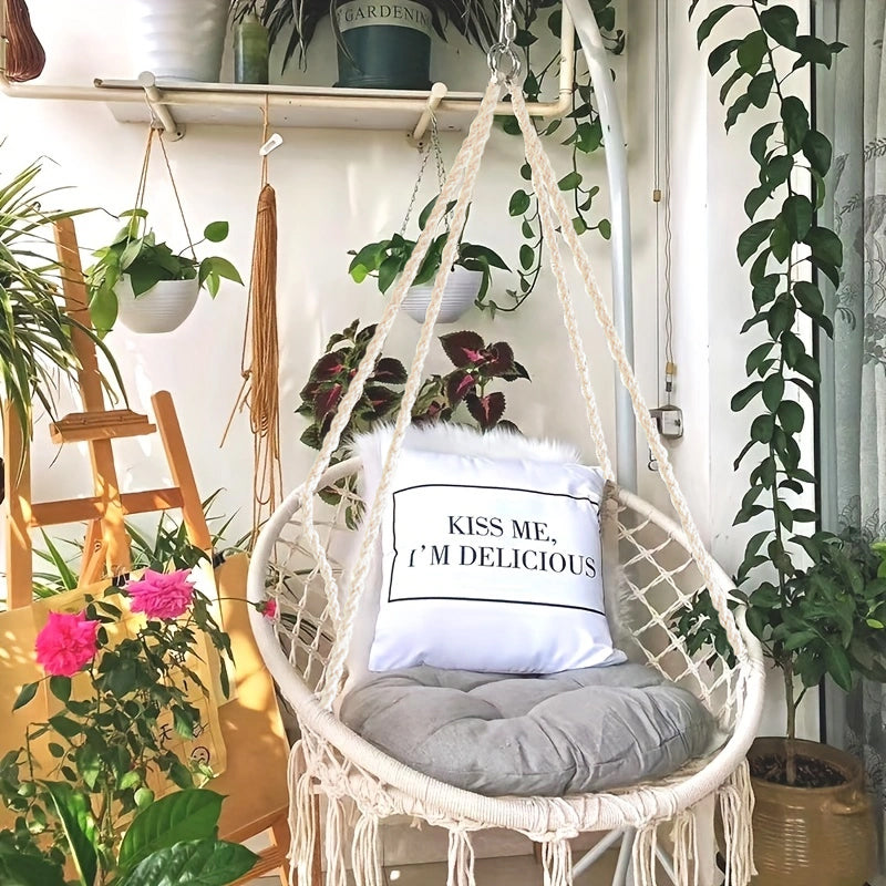 A swing chair in a Bohemian style with fringed design is foldable. Suitable for the garden. Outdoor use for gardens