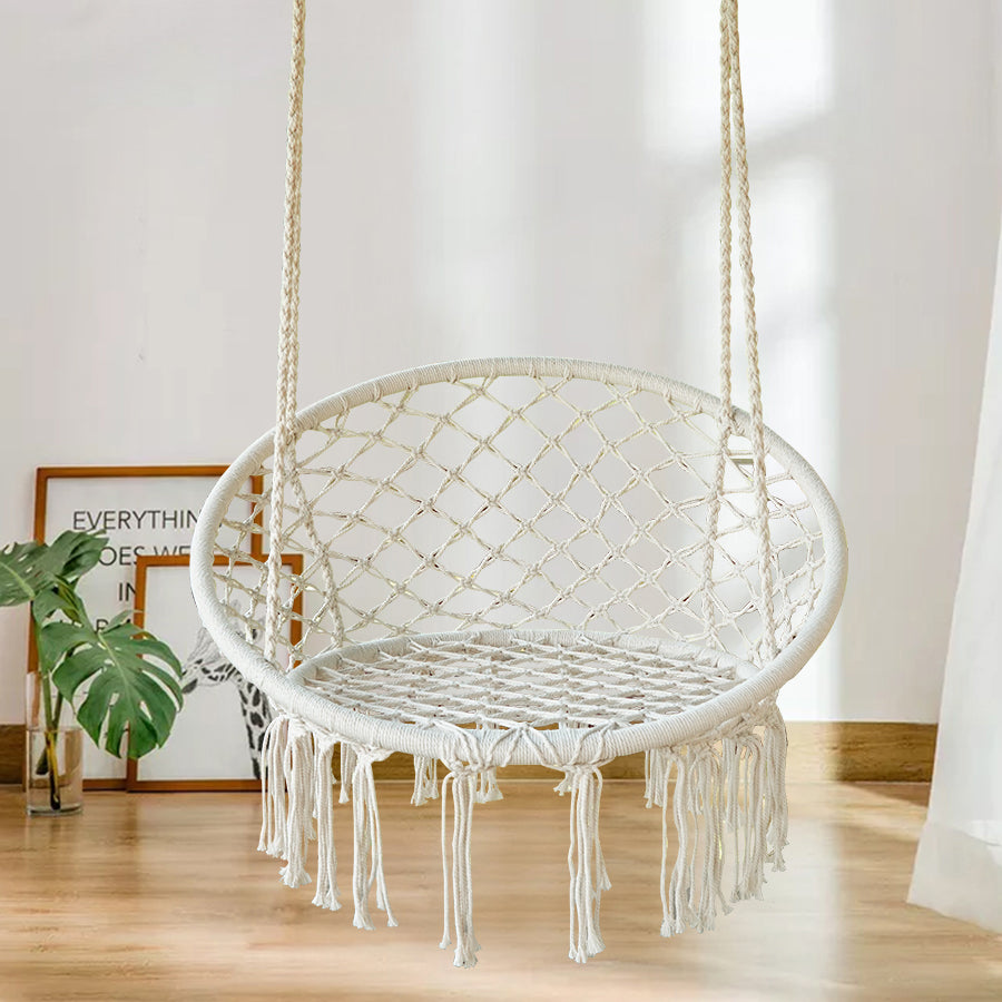 A swing chair in a Bohemian style with fringed design is foldable. Suitable for the garden. Outdoor use for gardens
